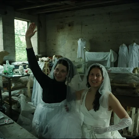 creepy Kodachrome photo of a disturbing hooded white brides in bridal gowns creeping into a room in 1936.<lora:boring-v4:0.8><lora:boring-alpha-v3:0.3> <lora:boring-v4-faces-version:0.3>