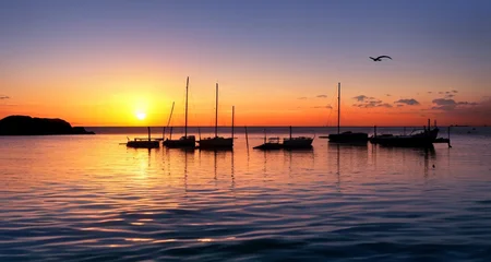 ((masterpiece)), (realistic), (sunset:1.2), (seascape:1.2), (colorful sky), (seagulls:1.1), (beach:1.1), (waves:1.1), (rocks:1.1), (boats:1.1), (reflection:1.2), (silhouette:1.2), (harbor:1.2), (peaceful:1.1), (serene:1.1), (tranquil:1.1), (calming:1.1), (harmonious:1.2),
The sun was setting over the horizon, painting the sky in a breathtaking array of colors. Shades of pink, orange, and yellow blended together to create a vibrant and colorful sky. Seagulls flew gracefully overhead, their wings casting shadows on the calm waters below. The beach was a peaceful and serene place, with waves gently lapping at the shore. Smooth rocks scattered along the coastline, providing a perfect spot for a quiet moment of reflection. Boats floated in the harbor, their masts creating silhouettes against the colorful sky. The reflection of the sky in the water created a harmonious and tranquil atmosphere. As the sun disappeared below the horizon, the sky turned darker, but the sense of calm remained, leaving a feeling of peacefulness and contentment.