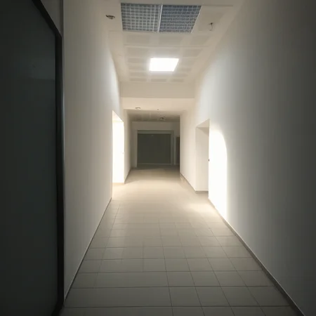 empty mall, photograph, a room with a door with light flowing from it