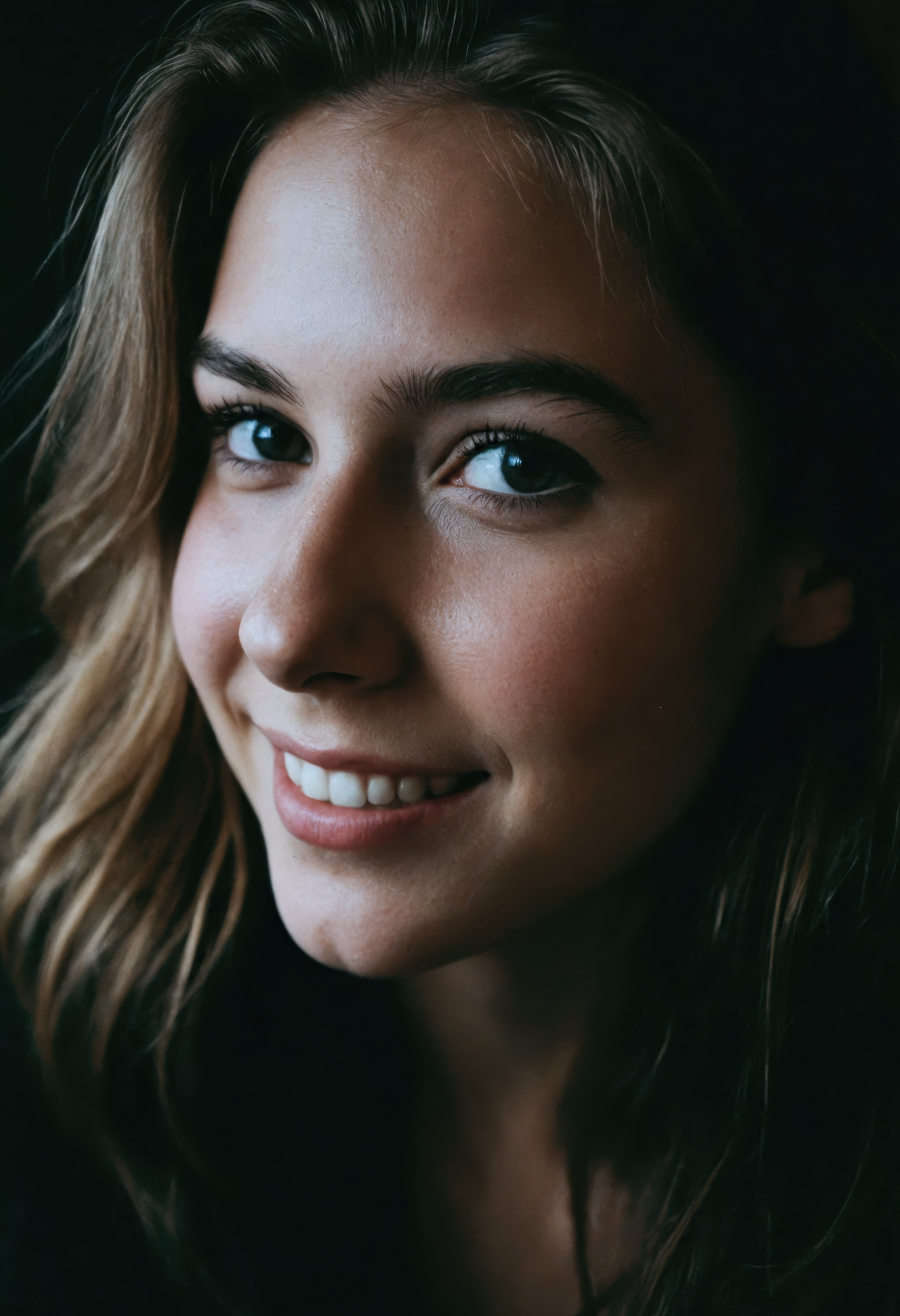 (close-up, RAW editorial photograph of a 21 year old woman), (highly detailed face:1.4) (smile:0.7) (background inside dark, moody, private study:1.3), POV, nikon d850, film stock photograph, 4 kodak portra 400, camera f1.6 lens, rich colors, hyper realistic, lifelike texture, dramatic lighting, cinestill 800